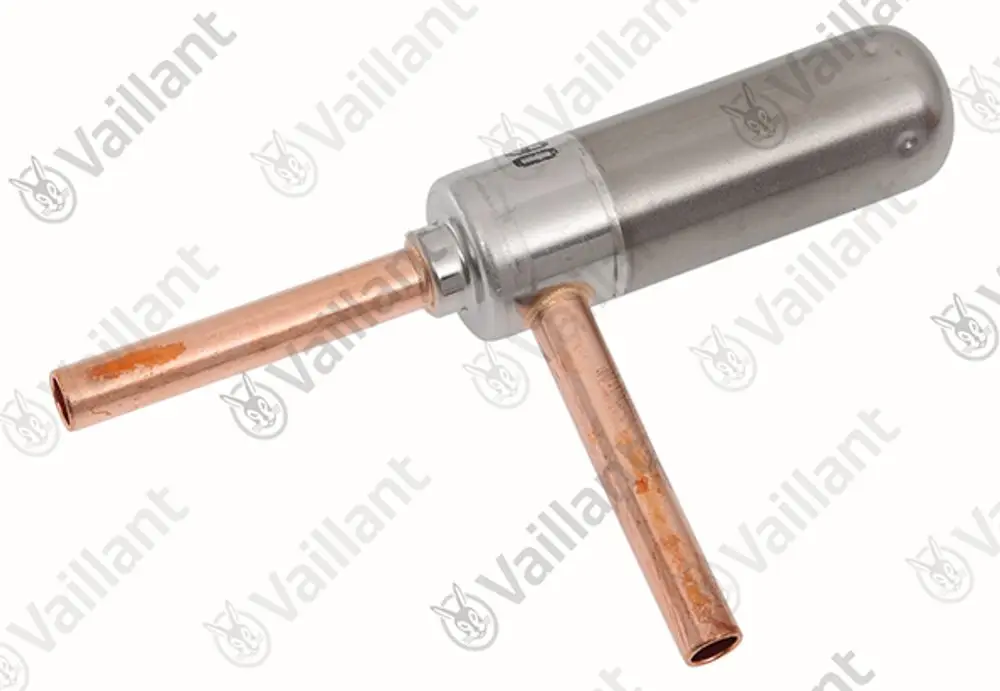 Vaillant Expansionsventil mit einem zylindrischen Gehäuse und zwei Kupferrohren. Das Gerät dient zur Regelung von Druck und Temperatur in Heizsystemen.